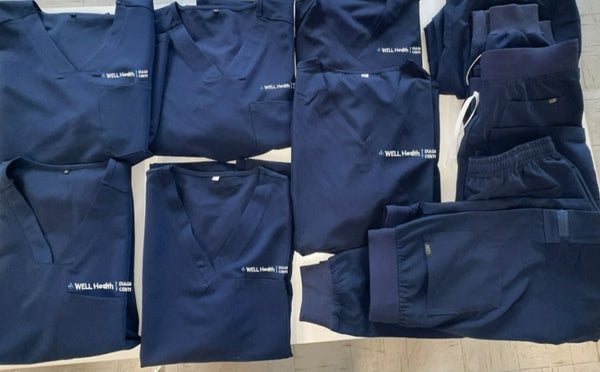 navy blue scrub sets embroidered with logo on left chest pocket of scrub top