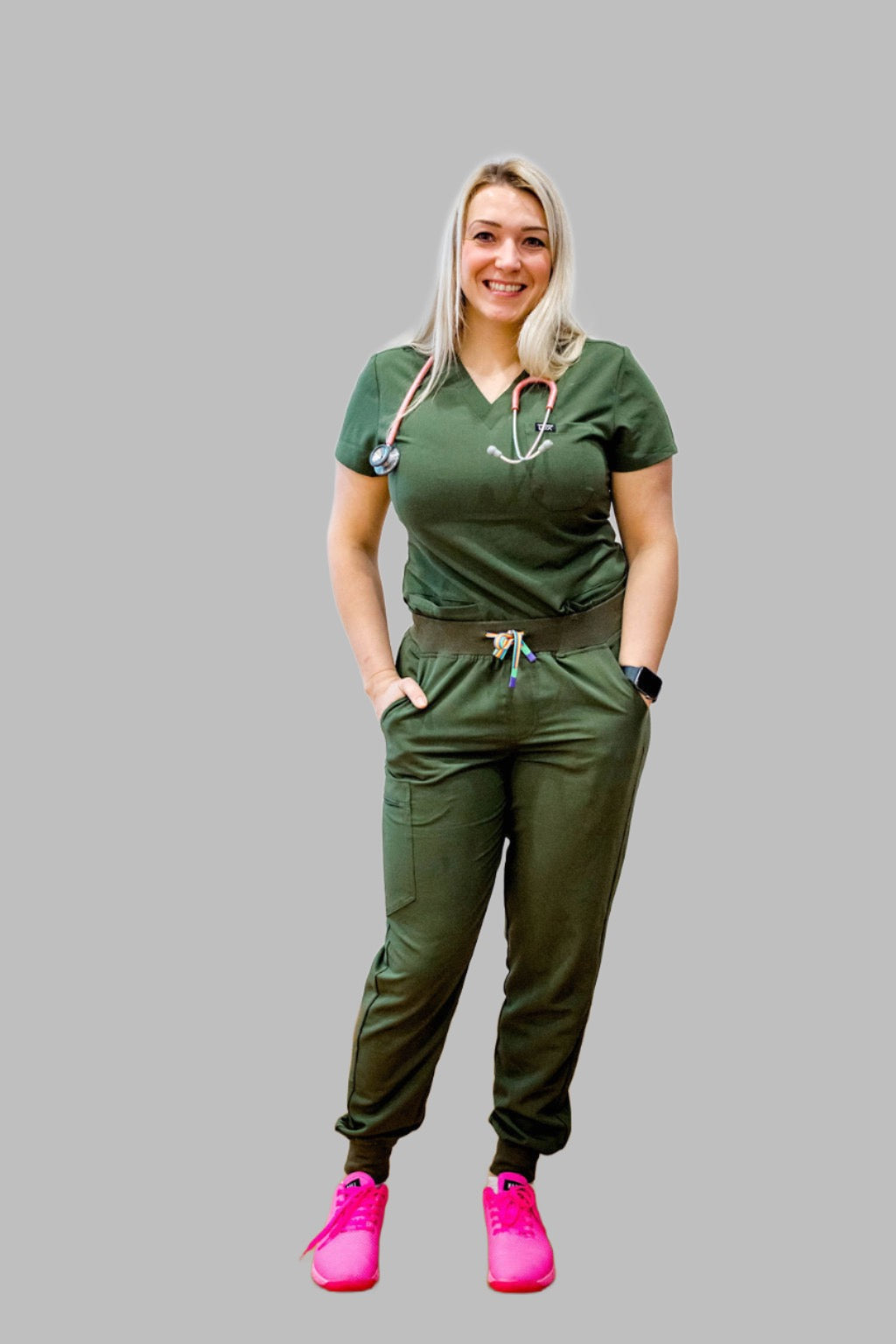 Lux Scrubs Olive Green Scrub Top. One chest pocket, two lower front pockets 