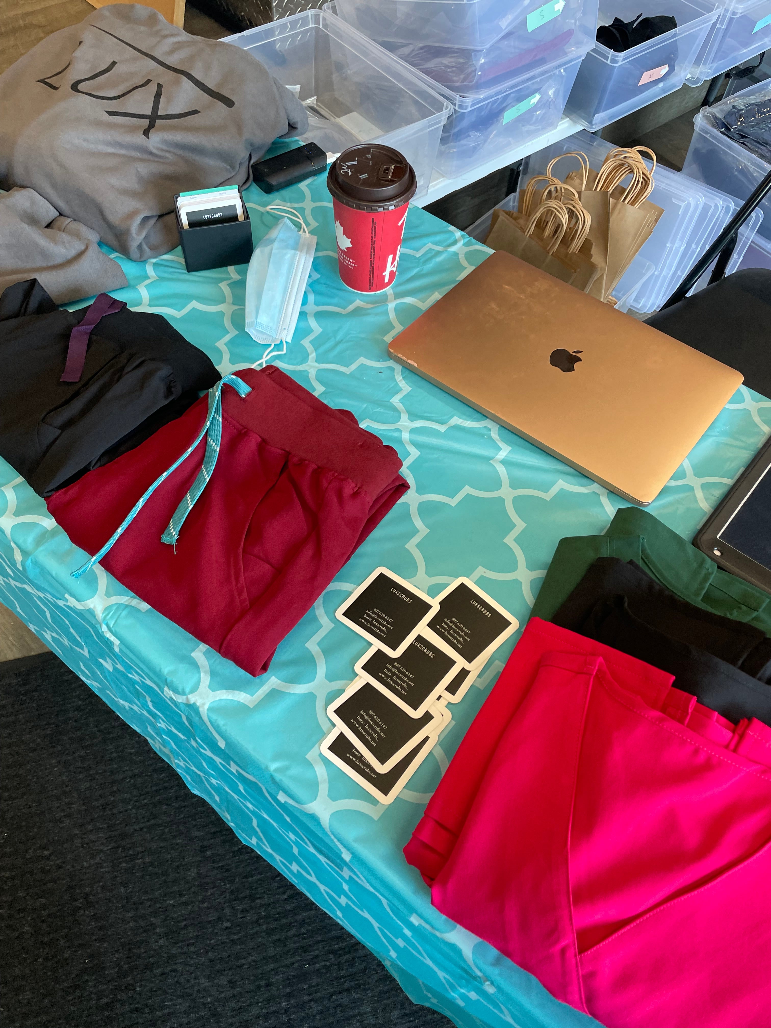 lux scrubs pop up table at nexus health and fitness 