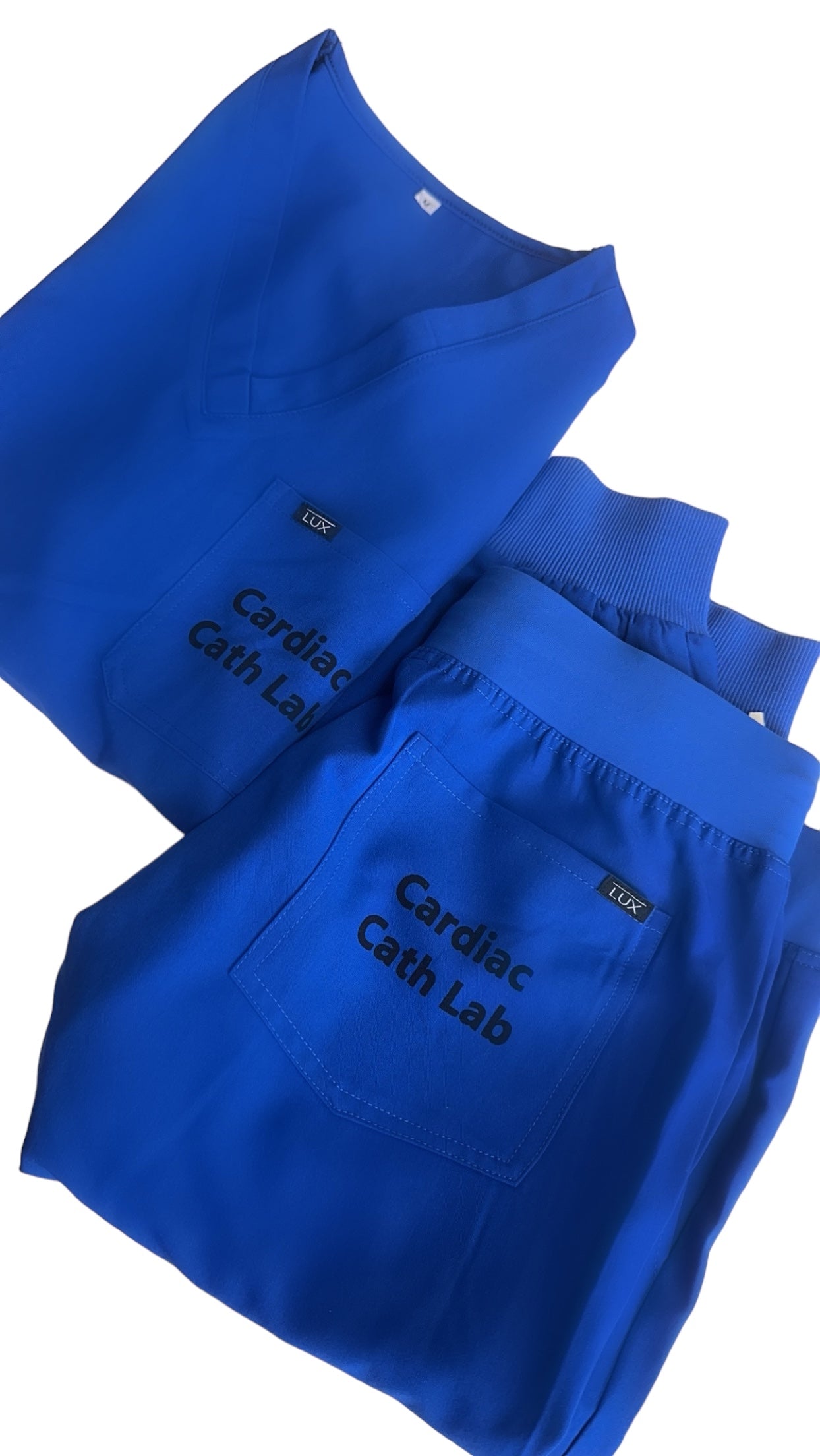 Screen print on Lux Scrubs Royal Blue Scrub Top and Joggers 